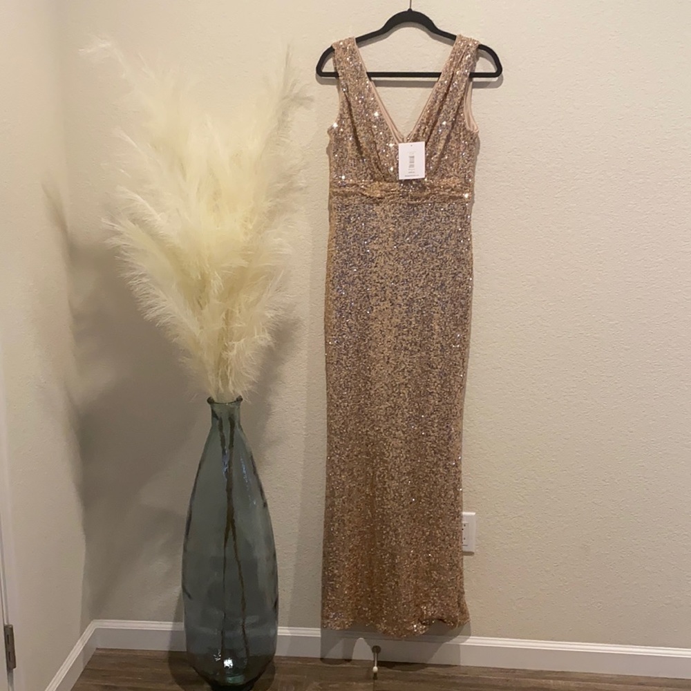 New with tags. Purchased for a wedding never worn